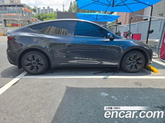 Tesla Model Y — Фото автомобиля 4