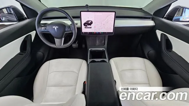 Tesla Model Y — Фото автомобиля 7