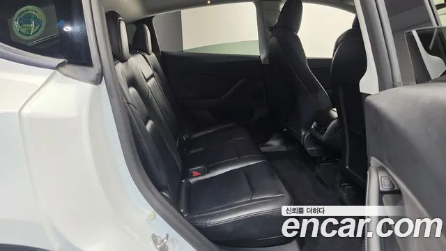 Tesla Model Y — Фото автомобиля 10