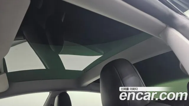Tesla Model 3 — Фото автомобиля 30