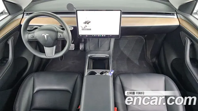 Tesla Model Y — Фото автомобиля 9