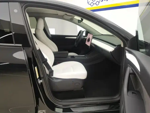 Tesla Model Y — Фото автомобиля 8