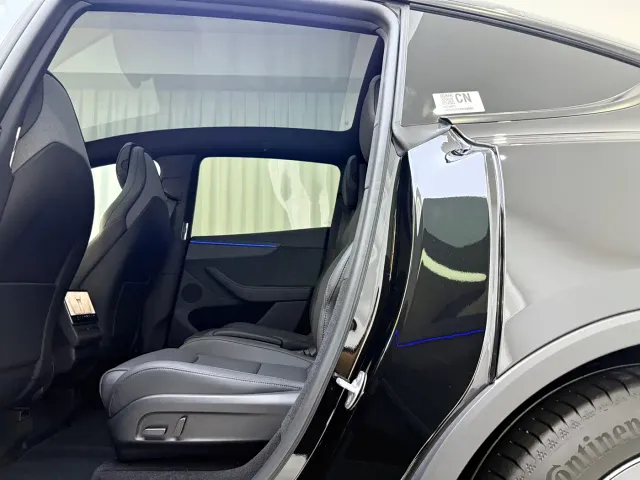 Tesla Model Y L — Фото автомобиля 6