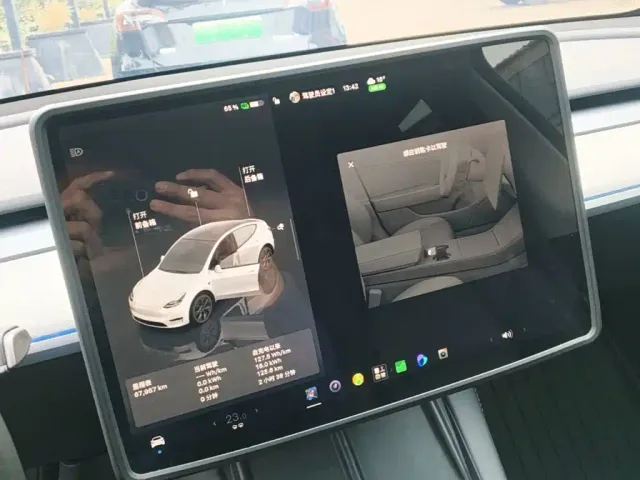 Tesla Model Y — Фото автомобиля 12