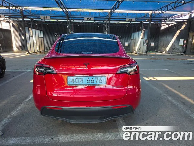 Tesla Model Y — Фото автомобиля 2