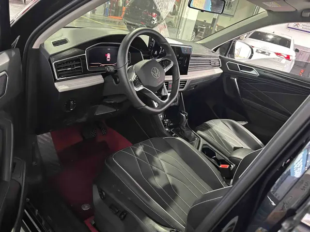 Volkswagen Tiguan L — Фото автомобиля 3