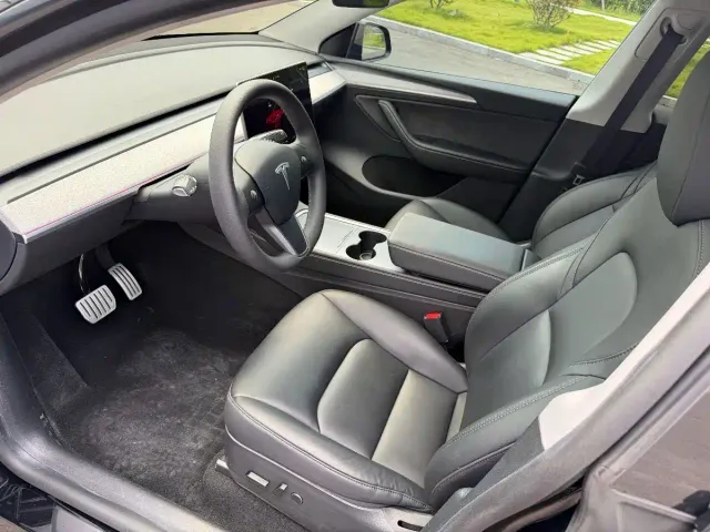 Tesla Model Y — Фото автомобиля 10