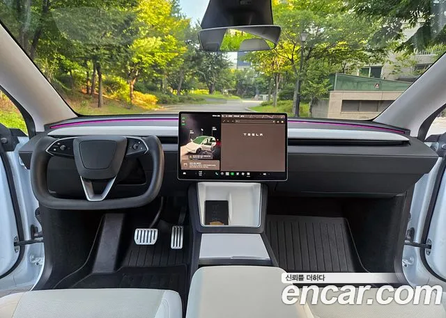 Tesla Model Y — Фото автомобиля 11