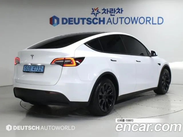 Tesla Model Y — Фото автомобиля 2