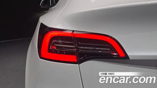 Tesla Model Y — Фото автомобиля 8