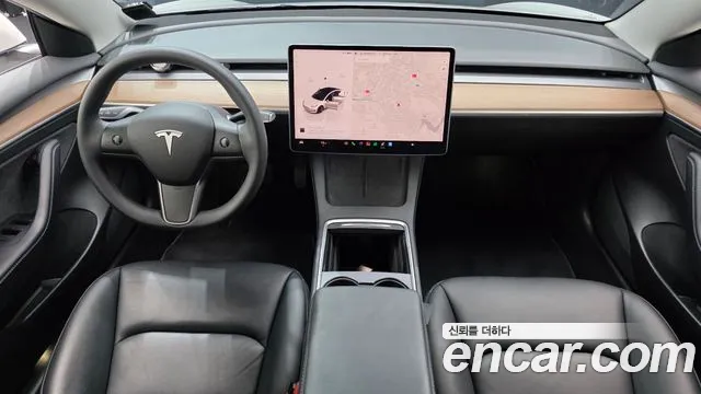 Tesla Model 3 — Фото автомобиля 10