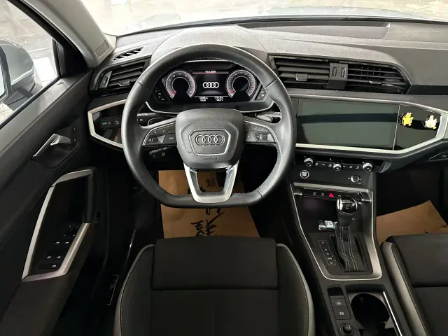 Audi Q3 — Фото автомобиля 11