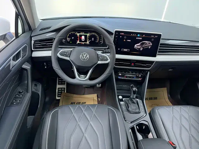Volkswagen Tiguan L — Фото автомобиля 24