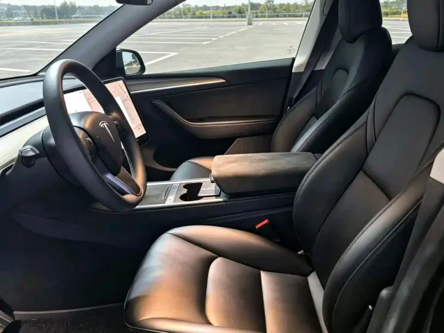 Tesla Model Y — Фото автомобиля 8