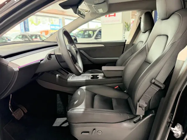 Tesla Model Y — Фото автомобиля 11
