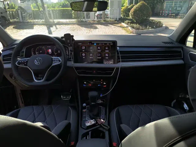 Volkswagen Tiguan L — Фото автомобиля 5