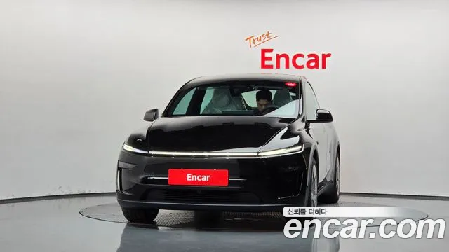 Tesla Model Y — Фото автомобиля 3