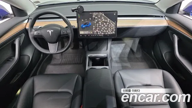 Tesla Model 3 — Фото автомобиля 10