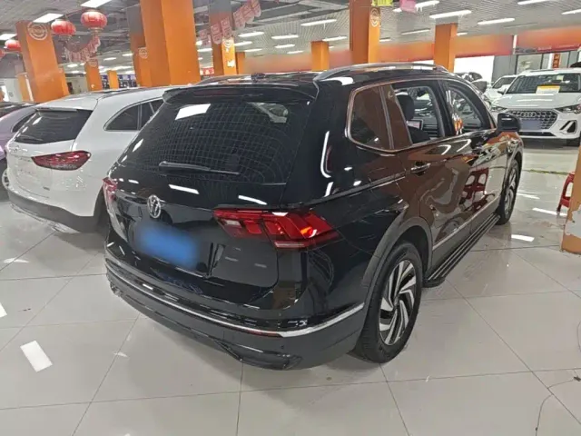Volkswagen Tiguan L — Фото автомобиля 6