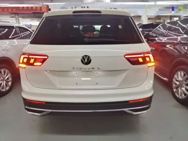 Volkswagen Tiguan L — Фото автомобиля 5
