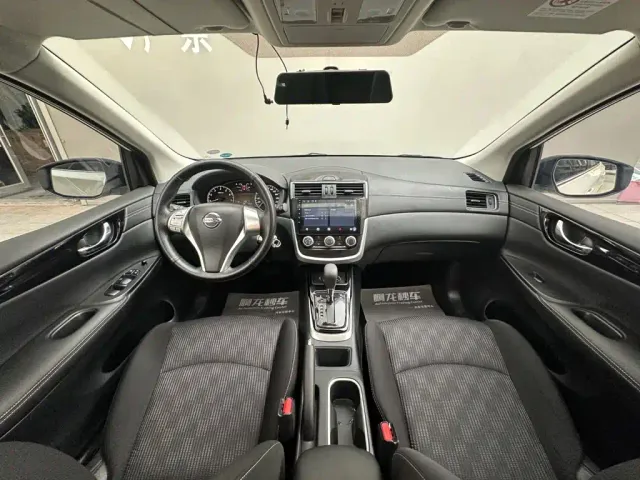 Nissan Tiida — Фото автомобиля 6