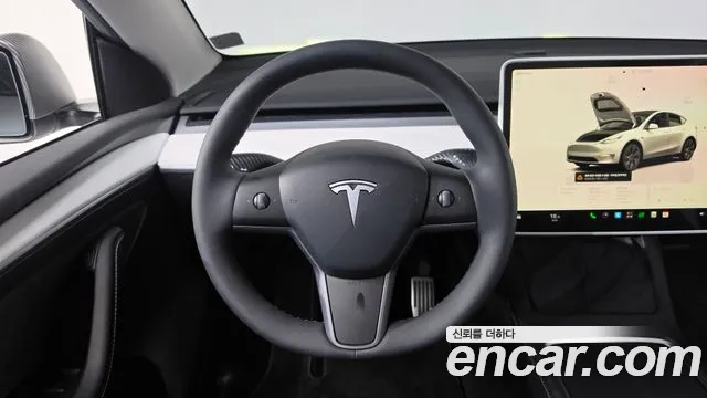 Tesla Model Y — Фото автомобиля 19