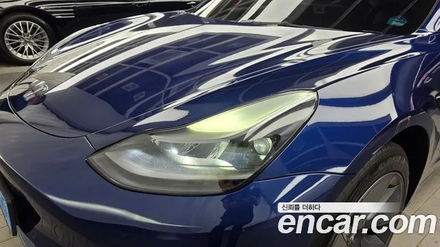Tesla Model 3 — Фото автомобиля 7