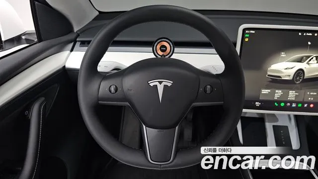Tesla Model Y — Фото автомобиля 17