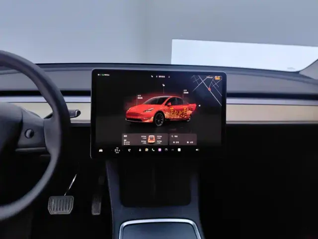 Tesla Model Y — Фото автомобиля 13