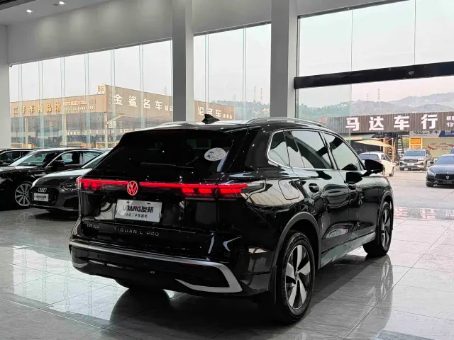 Volkswagen Tiguan L — Фото автомобиля 4