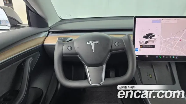 Tesla Model 3 — Фото автомобиля 13