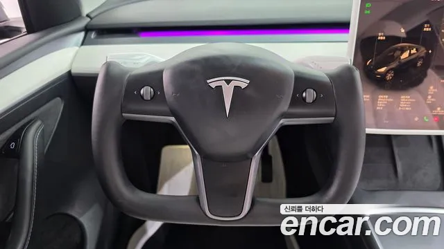 Tesla Model Y — Фото автомобиля 18