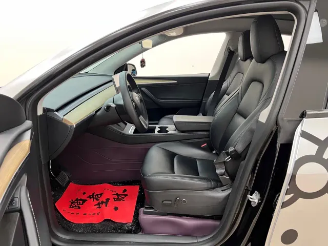 Tesla Model Y — Фото автомобиля 14