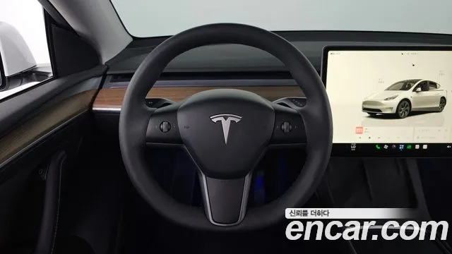 Tesla Model Y — Фото автомобиля 13