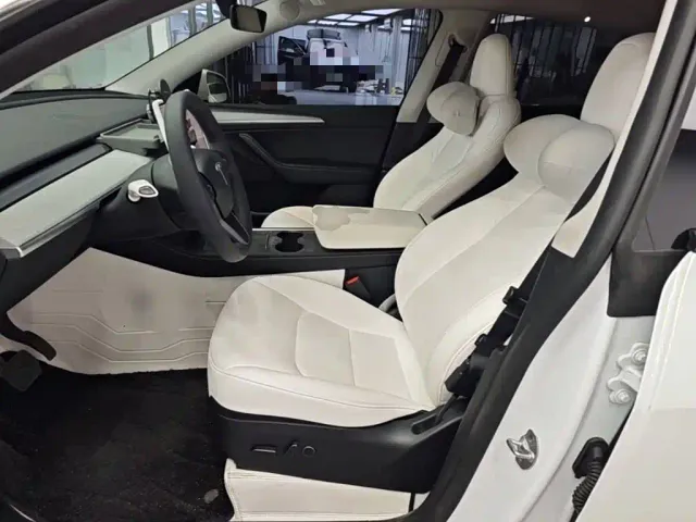 Tesla Model Y — Фото автомобиля 14