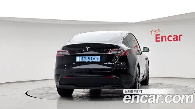 Tesla Model Y — Фото автомобиля 4