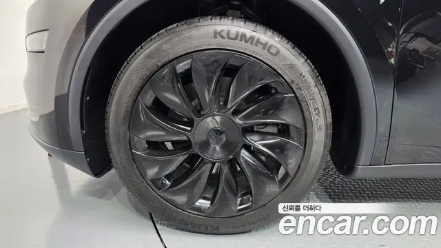 Tesla Model Y — Фото автомобиля 5