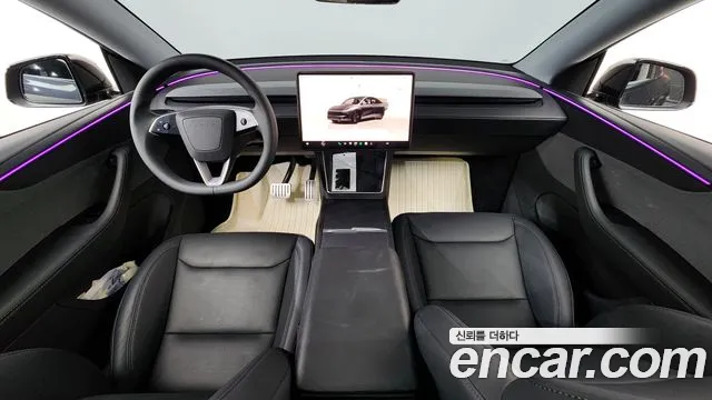Tesla Model Y — Фото автомобиля 7