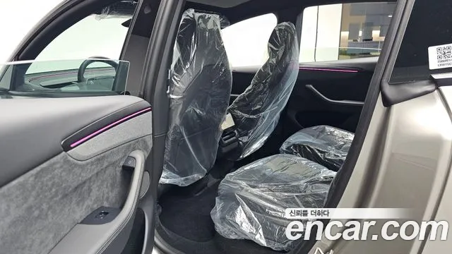 Tesla Model Y — Фото автомобиля 18