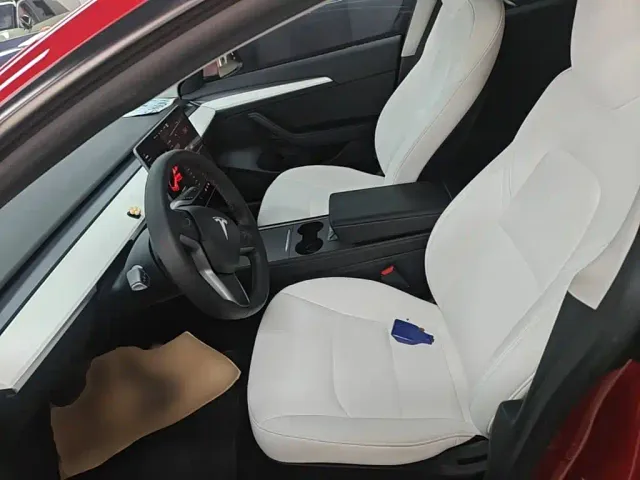 Tesla Model 3 — Фото автомобиля 14