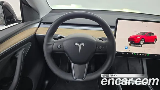 Tesla Model Y — Фото автомобиля 13