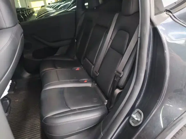 Tesla Model Y — Фото автомобиля 16