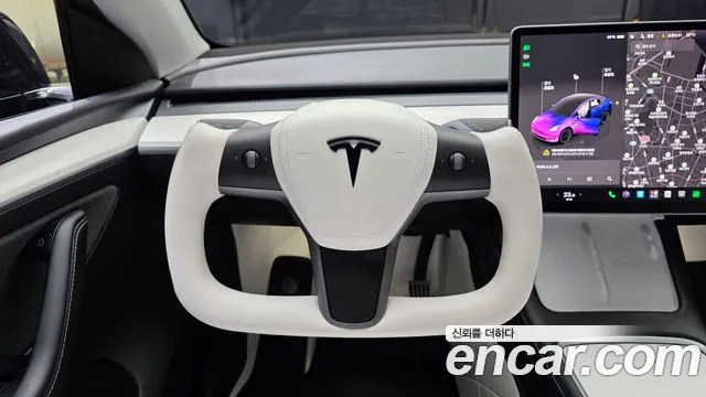 Tesla Model Y — Фото автомобиля 19