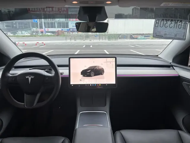 Tesla Model Y — Фото автомобиля 11