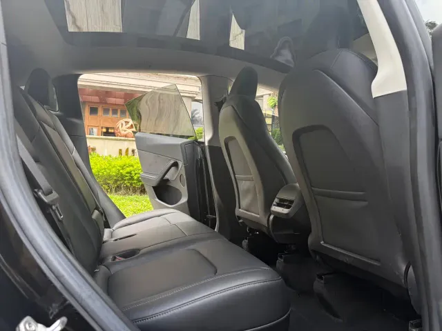 Tesla Model Y — Фото автомобиля 12