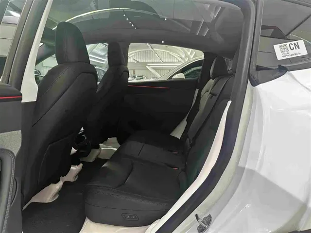 Tesla Model Y — Фото автомобиля 11