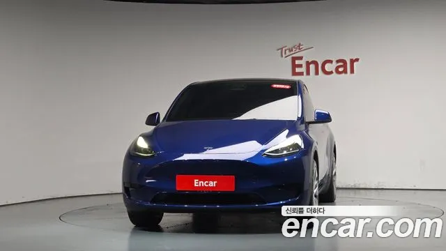 Tesla Model Y — Фото автомобиля 3