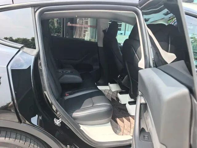 Tesla Model Y — Фото автомобиля 10