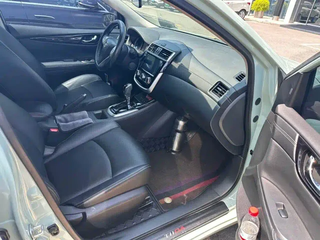 Nissan Tiida — Фото автомобиля 7