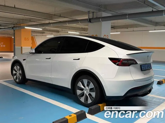 Tesla Model Y — Фото автомобиля 4